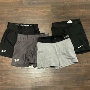 4 Pair of Nike and Under Armour Shorts